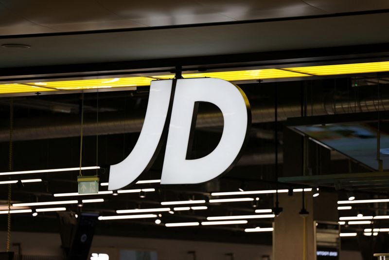 JD Sports storefront showcasing sportswear amid profit warning news - Global Banking & Finance Review