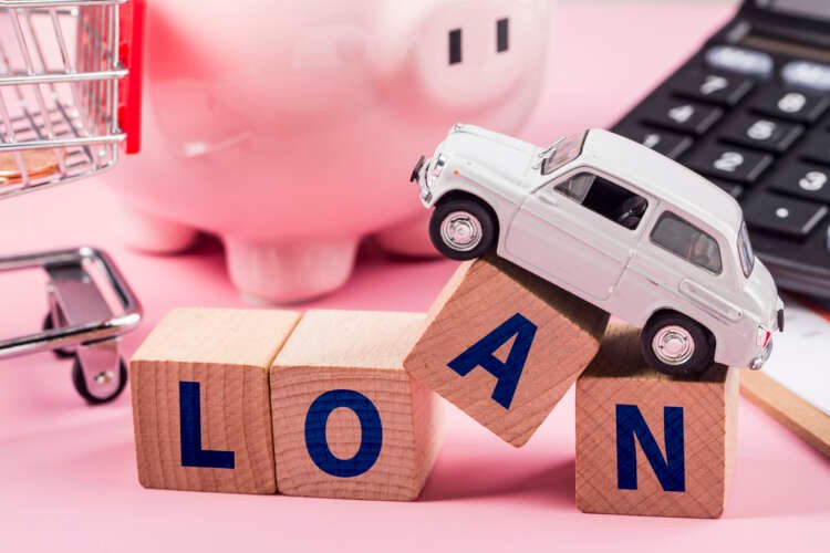 Car buyer evaluating competitive auto loan rates in tough lending market - Global Banking & Finance Review
