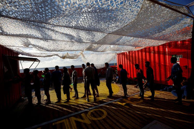 Migrants aboard the Open Arms Uno await docking in Europe - Global Banking & Finance Review
