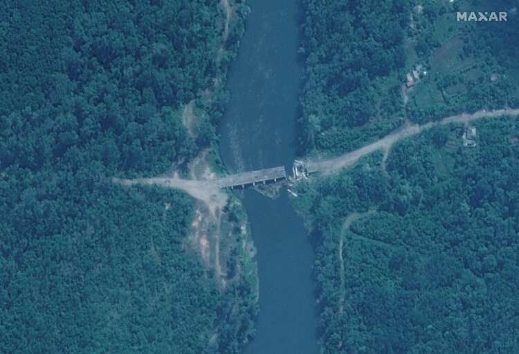 Satellite image depicting a damaged bridge in Rubizhne, highlighting the Ukraine-Russia conflict - Global Banking & Finance Review