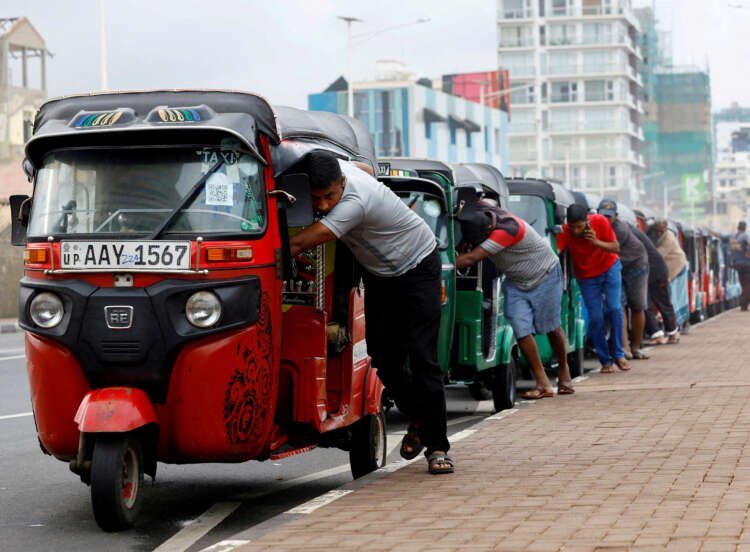 Drivers queue in auto rickshaws for petrol during Sri Lanka's economic crisis - Global Banking & Finance Review