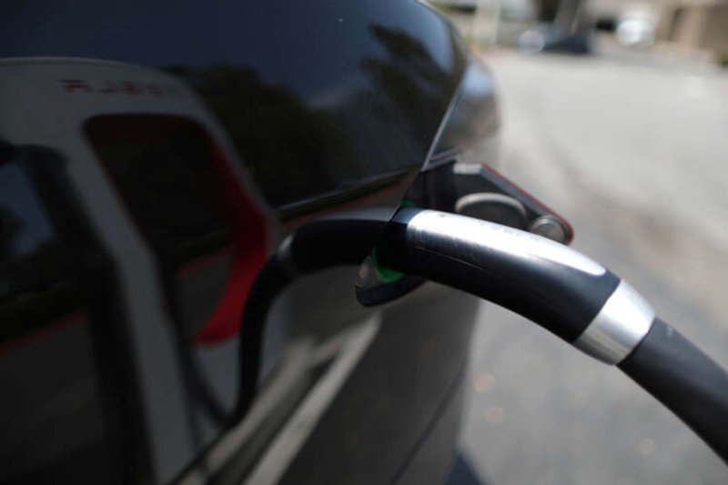 Image for Exclusive-To tap U.S. government billions, Tesla must unlock EV chargers