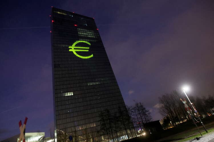 ECB headquarters illuminated, reflecting monetary policy impacts on global markets - Global Banking & Finance Review