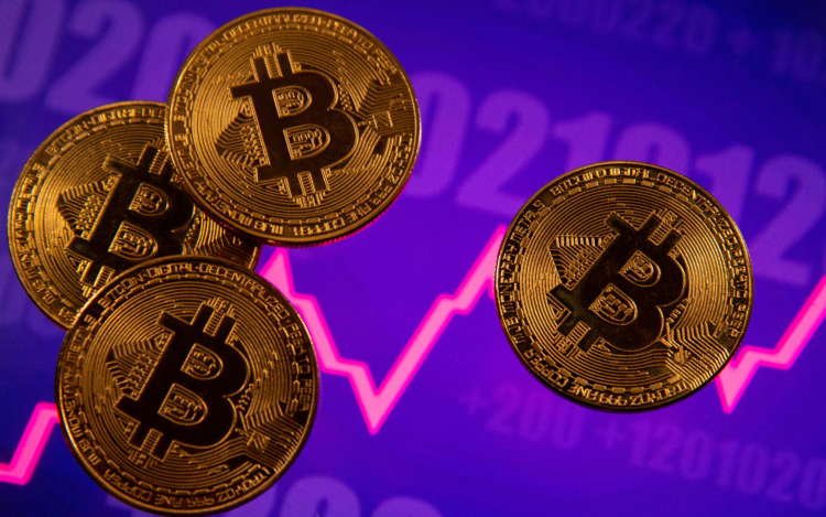 Bitcoin representation with stock graph backdrop related to crypto payment ban in Turkey - Global Banking & Finance Review