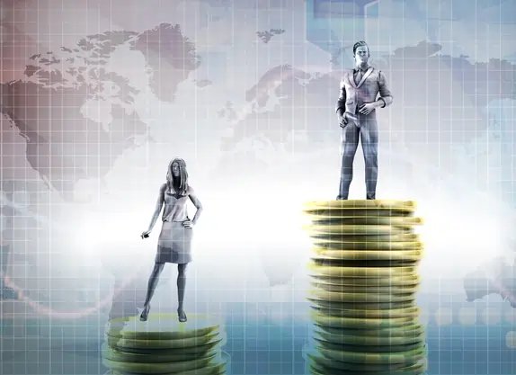 Diverse group of women in tech collaborating to close the gender pay gap - Global Banking & Finance Review