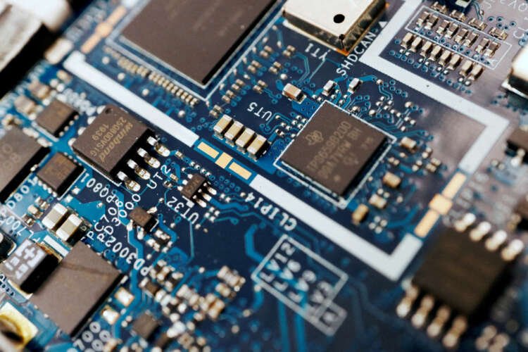 Semiconductor chips on a circuit board, reflecting Germany's security concerns over Chinese investments - Global Banking & Finance Review
