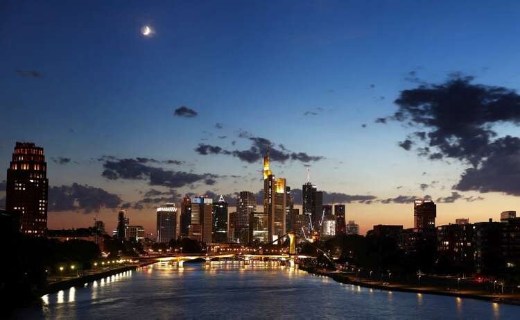 Sunset over Frankfurt skyline, symbolizing Germany's economic strategies - Global Banking & Finance Review