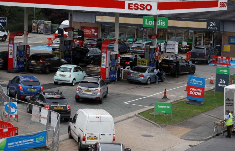 Line of vehicles at a petrol station amid fuel shortages in the UK - Global Banking & Finance Review