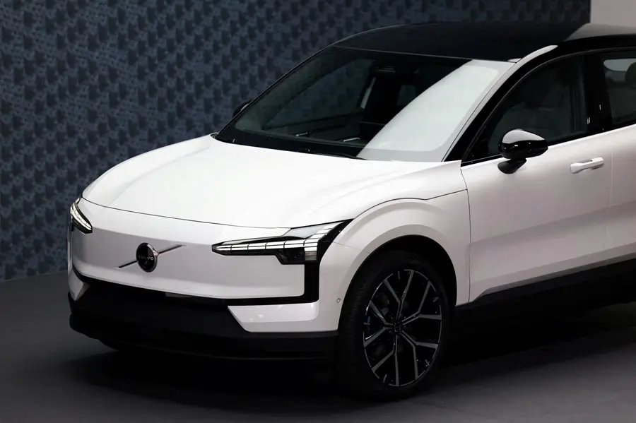 Volvo Cars logo with electric vehicle batteries, highlighting their venture with Northvolt - Global Banking & Finance Review