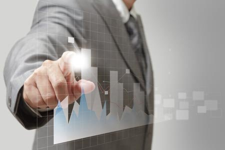 A man analyzing growth trends in luxury goods sector - Global Banking & Finance Review