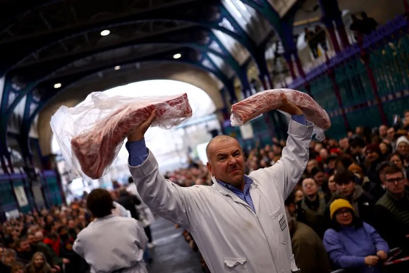 Image for Punters throng London’s historic Christmas meat auction