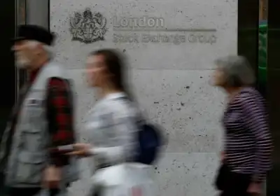 Image for Consumer staples, energy stocks boost FTSE 100; delayed reopening cap gains