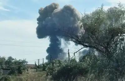 Image for Five injured as blasts rock Russian air base in annexed Crimea