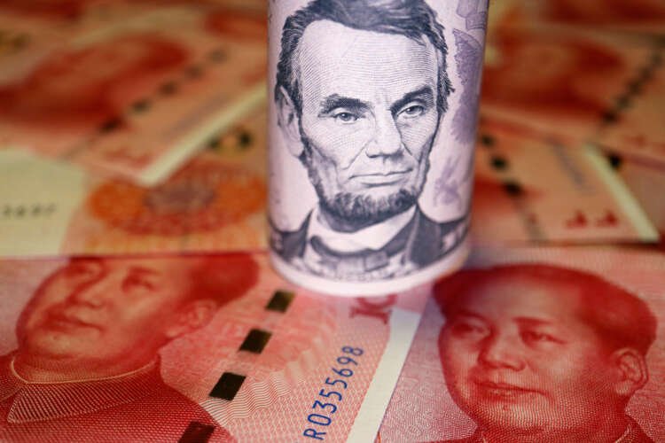 U.S. Dollar and Chinese Yuan banknotes reflecting market trends - Global Banking & Finance Review