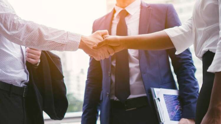 A dynamic business meeting illustrating progress and innovation in finance - Global Banking & Finance Review