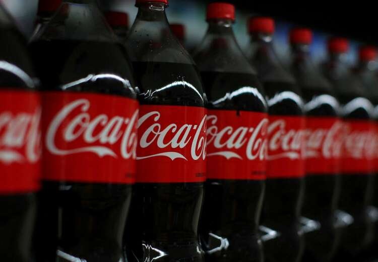 Coca-Cola soda products displayed highlighting earnings growth - Global Banking & Finance Review