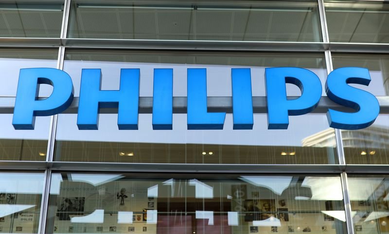 Philips company logo with financial graph background - Global Banking & Finance Review