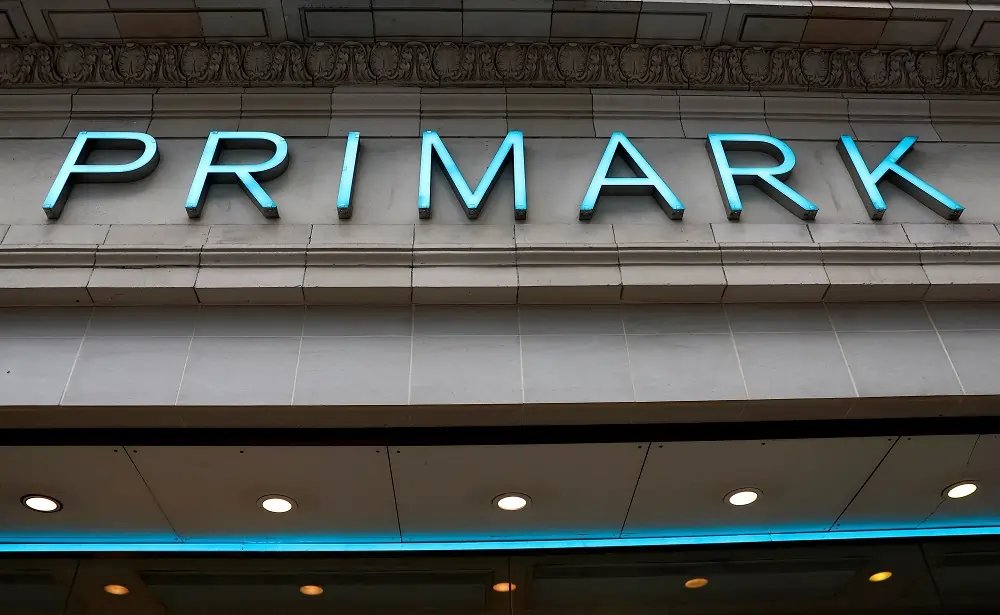 Primark logo with UK store workers’ pay increase announcement - Global Banking & Finance Review