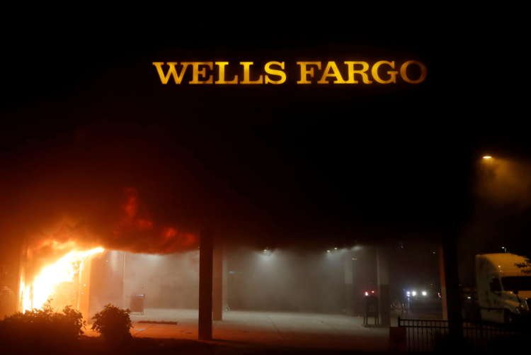 Image for Wells Fargo scores the latest narrow win for CEO pay