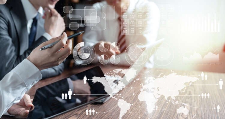 Business professionals analyzing data and leadership strategies in finance - Global Banking & Finance Review