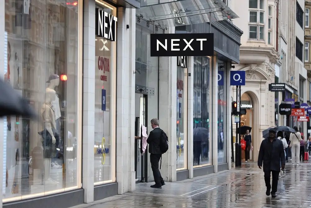 Britain's Next store front showcasing clothing sales amid rising profits - Global Banking & Finance Review