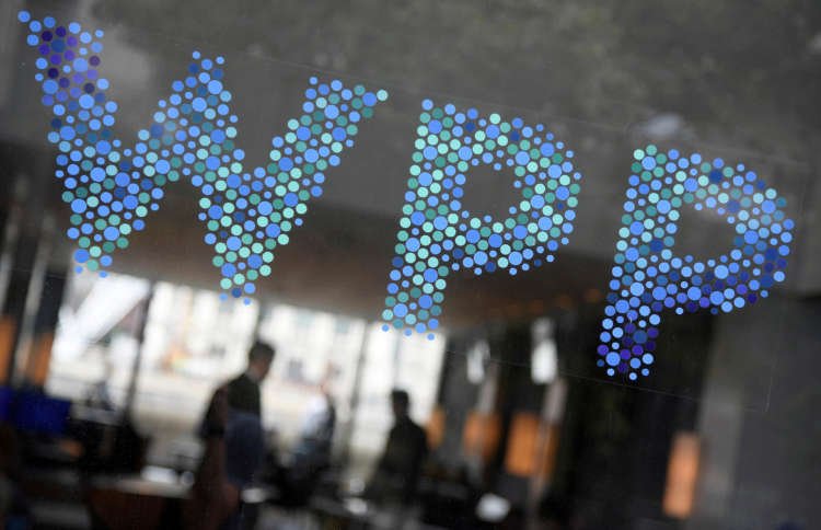 WPP advertising group logo with upward trend, symbolizing growth in client spending - Global Banking & Finance Review