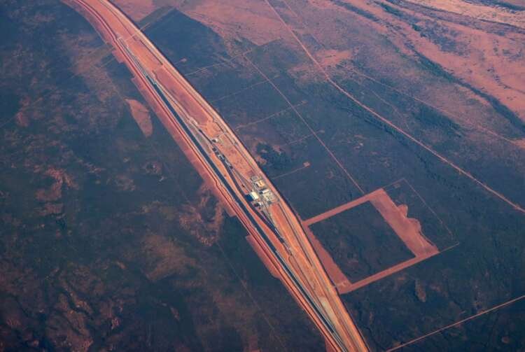 FILE PHOTO: Iron ore mining operations, including a rail network, can be seen in outback Western Australia near the city of Port Hedland