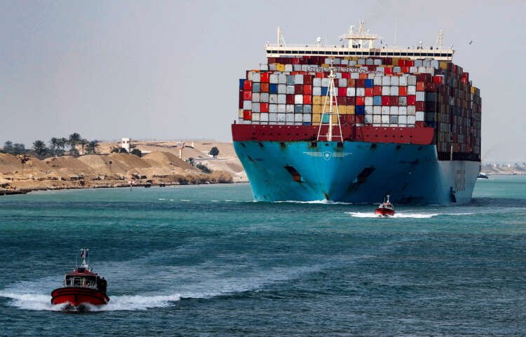 A cargo ship navigates the Suez Canal, symbolizing foreign investment in Egypt - Global Banking & Finance Review