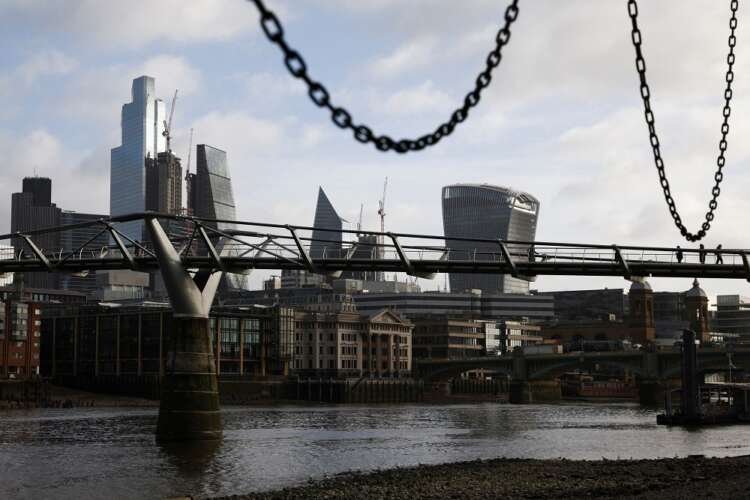 View of London's financial district showcasing Millennium Bridge, relevant to UK's economic growth - Global Banking & Finance Review