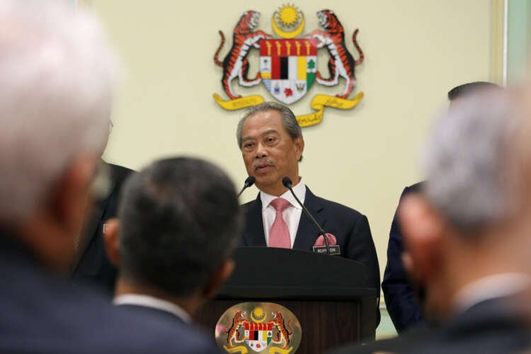 Malaysia’s Prime Minister Muhyiddin Yassin speaks during a news conference in Putrajaya