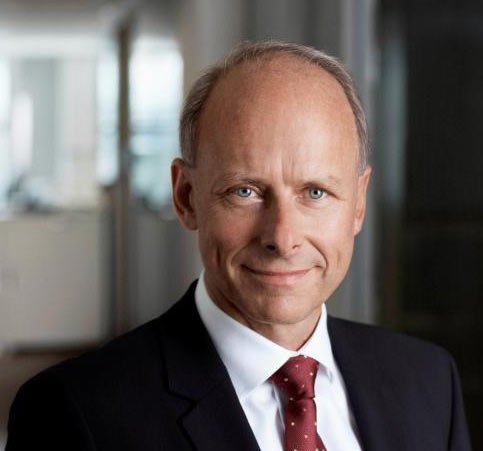 Business executive analyzing IT investment strategies for operational efficiency - Global Banking & Finance Review