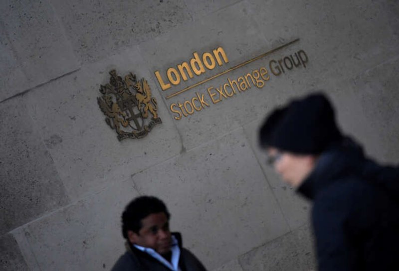 Image for FTSE 100 dragged down by Unilever, positive earnings push mid-caps