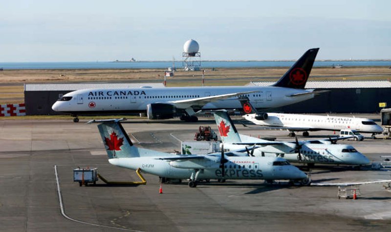 Image for Air Canada signs C$5.9 billion government aid package, agrees to buy Airbus, Boeing jets