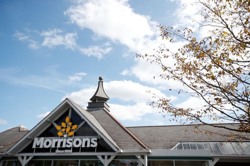 Morrisons logo with shopping cart reflecting Christmas sales impact - Global Banking & Finance Review
