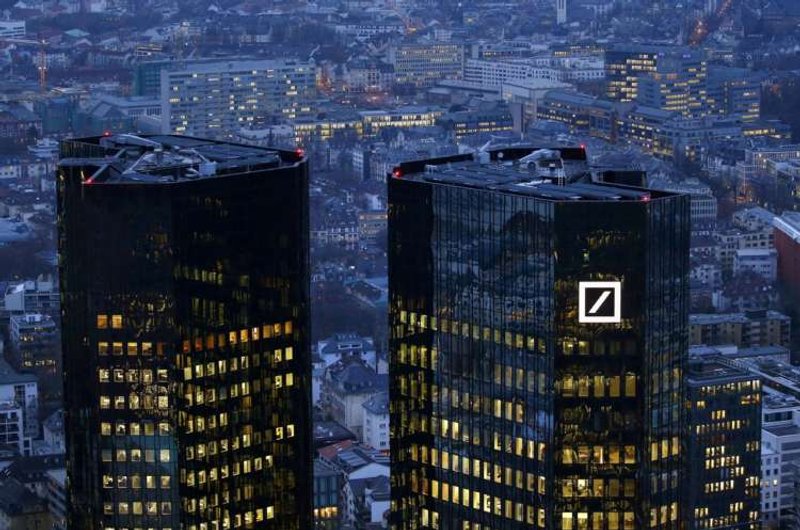 Image for Analysis: Merkel’s vote of confidence in Deutsche Bank belies lender’s problems