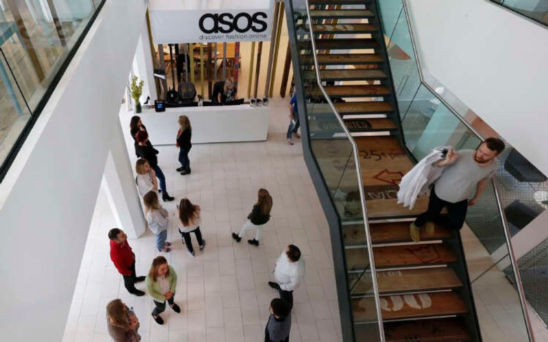 Image for ASOS reports first-half loss as shoppers cut back