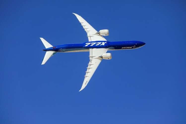 FILE PHOTO: A Plane Boeing 777X performs during the Dubai Airshow, in Dubai