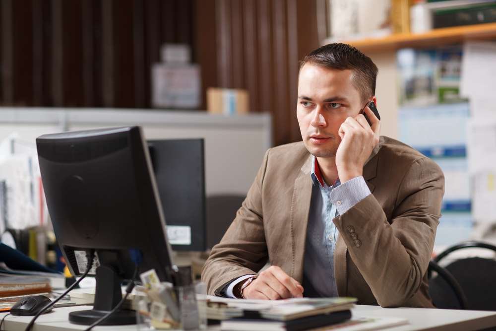 Dynamic financial professionals discussing growth strategies - Global Banking & Finance Review