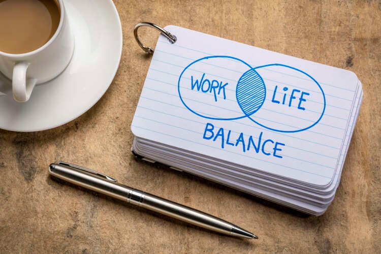 Work-life balance concept with people celebrating rewards in an office - Global Banking & Finance Review
