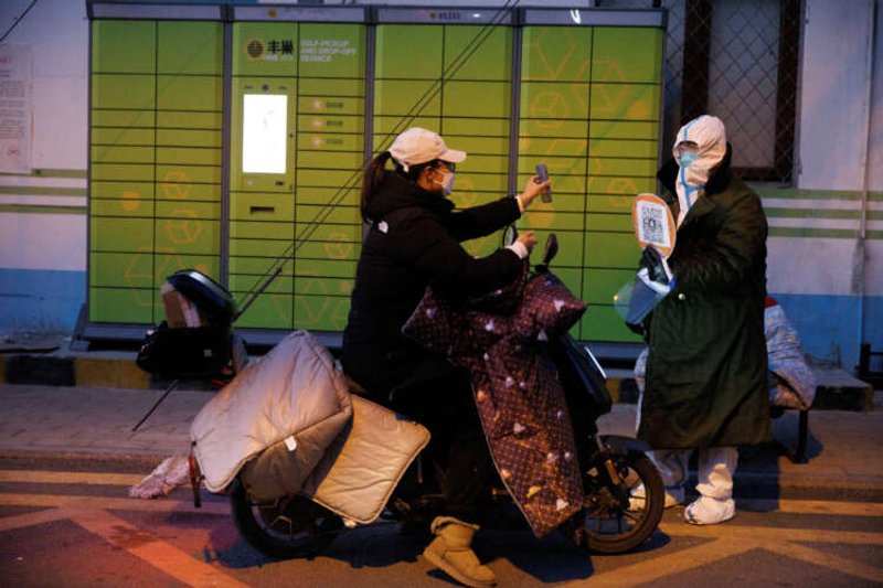 Image for China’s patchy COVID easing sows confusion but comforts investors