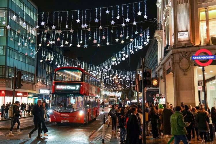 Festive display of Christmas lights on Oxford Street, symbolizing Card Factory's sales boost - Global Banking & Finance Review
