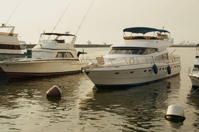 Boats on the shore in Sydney, highlighting its appeal for finance careers - Global Banking & Finance Review