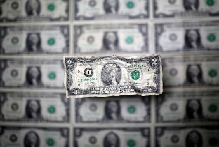 U.S. dollar banknote with declining value amid focus on potential rate cuts - Global Banking & Finance Review