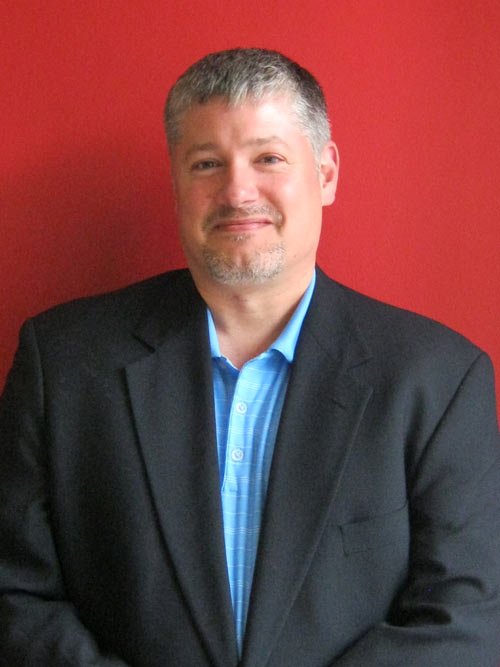 Charles Hanna discussing ECM technology benefits for insurance compliance - Global Banking & Finance Review