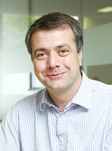 Image of a business team discussing strategies for SearchFlow's expansion - Global Banking & Finance Review