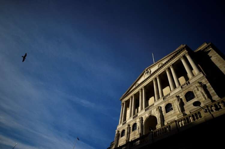 The Bank of England building with a bird in flight, symbolizing interest rate changes - Global Banking & Finance Review