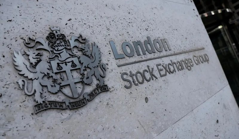 Image for FTSE 100 hits record high, pound slips ahead of BoE verdict