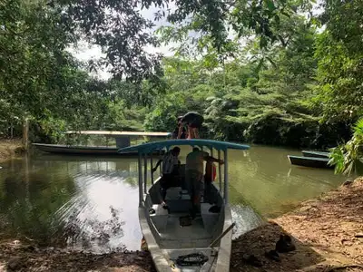Image for FEATURE-In Ecuador’s Amazon, solar panels bring ‘fire canoe’ dream to life