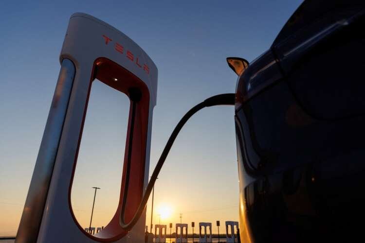Image for Factbox-More automakers plug into Tesla’s EV charging network