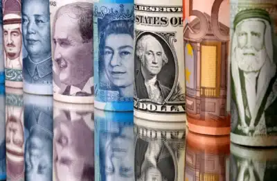Image for Dollar dips, Aussie gains on improving risk sentiment